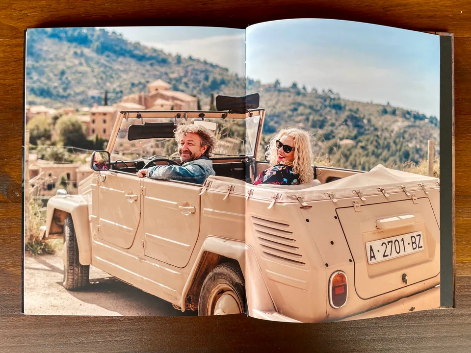Restaurante Sebastian book spread with Deià drive